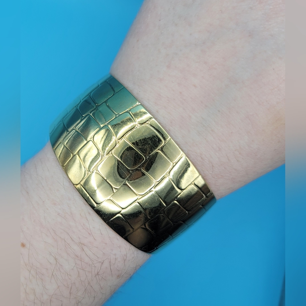 Avon cuff gold tone
